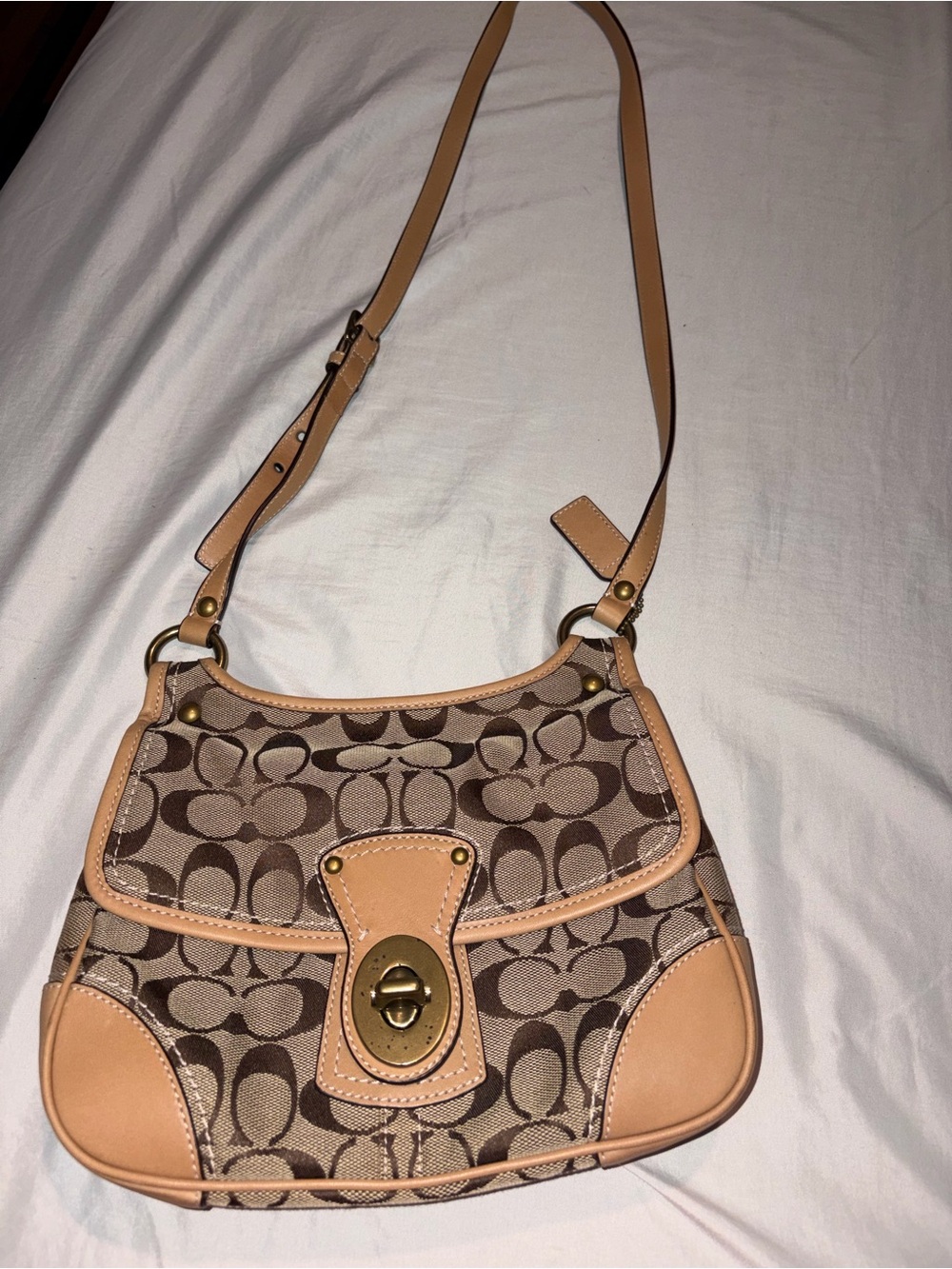 Coach Signature Saddle Bag in Brown and Tan
